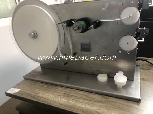 Buy The Inner Hole φ38 HME Filter Paper Tape Winding Machine with Capacity of 900-1200pcs/hour online manufacture